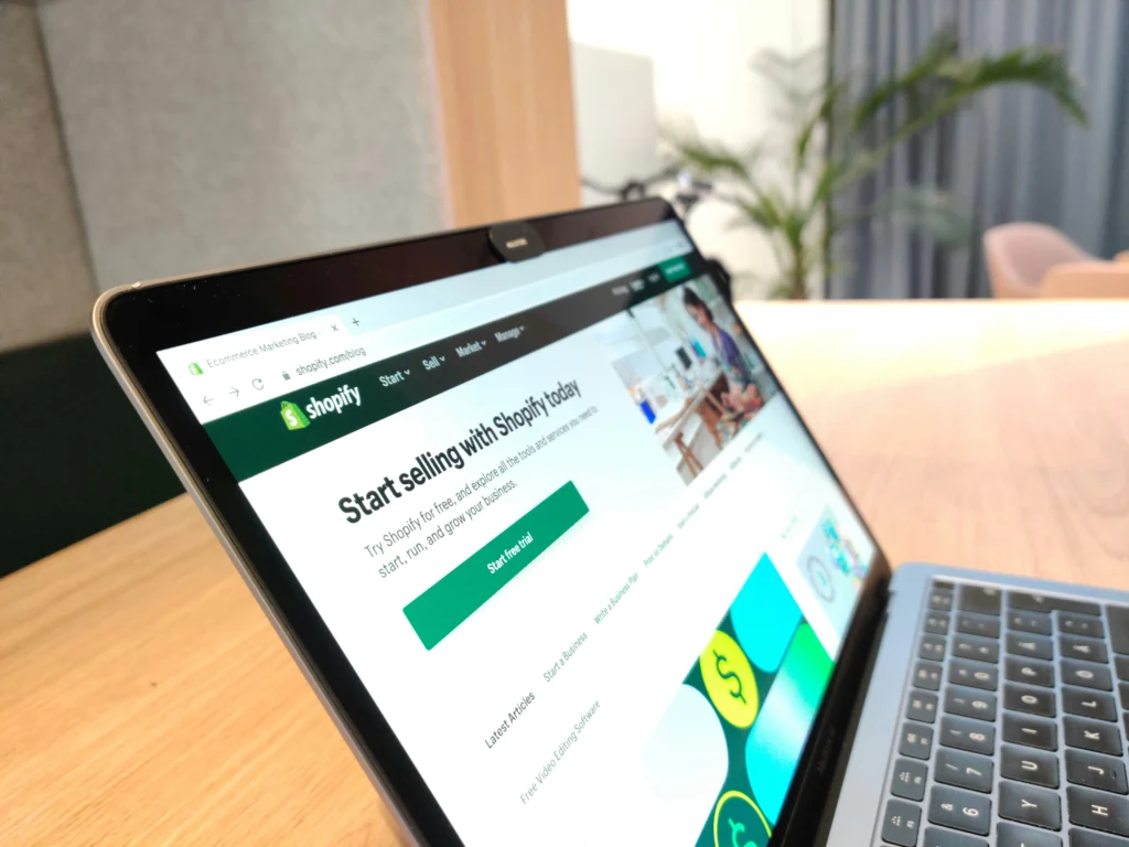A laptop showing shopify dashboard